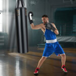 4-In-1 Hanging Punching Bag Set with Punching Gloves and Ceiling Hook - Image 2